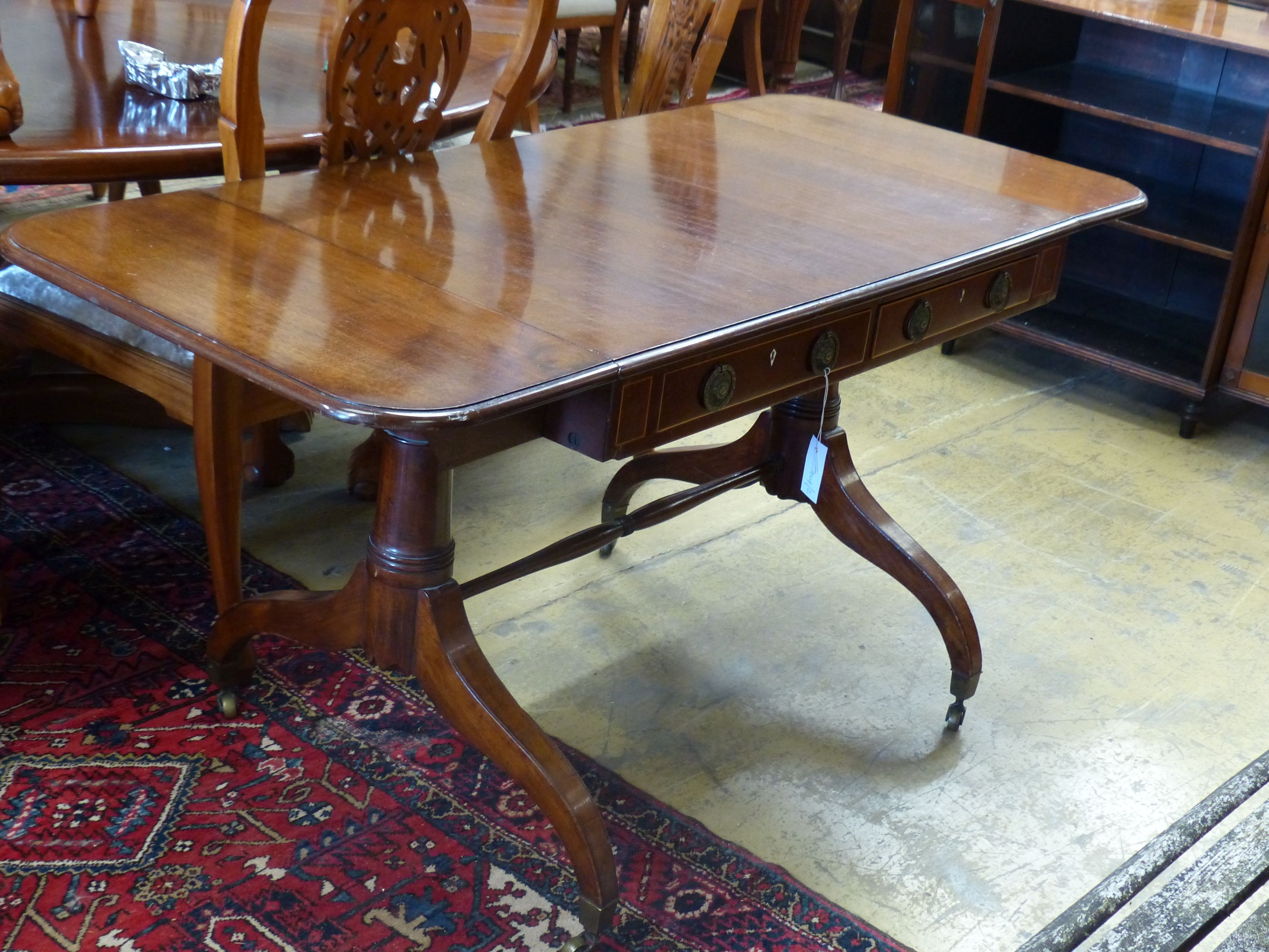 A 19th century mahogany sofa table, 150cm extended, depth 66cm, height 73cm